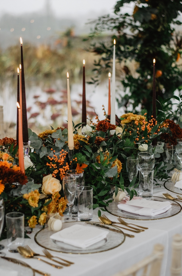 Wedding table styled in burnt orange props and flowers by Debrah J Events in Yorkshire