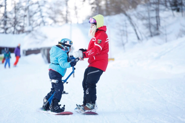 adult and child skiing