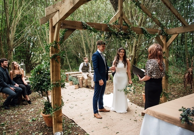 Couple have a woodland wedding ceremony at Low Osgoodby Grange venue in Yorkshire.