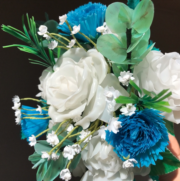 Blue and white wedding bouquet made from plastic bottles by Ecoblooms