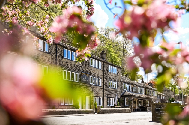 Huddersfield wedding venue Woodman Inn exterior with blossom