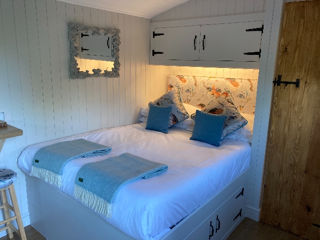 image of bedroom inside shepherds hut