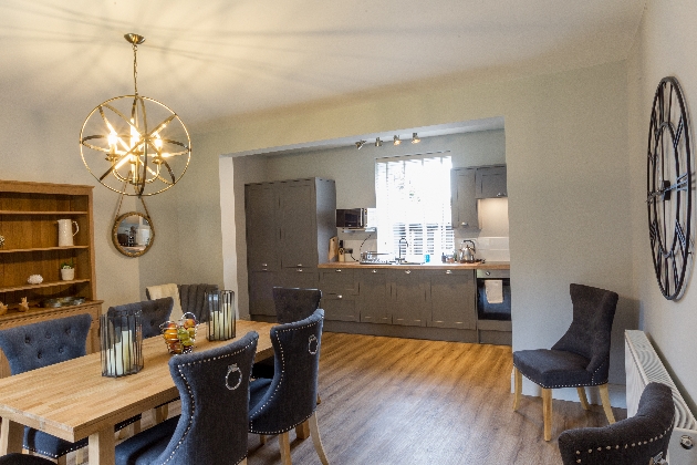 modern open plan kitchen in grey tones