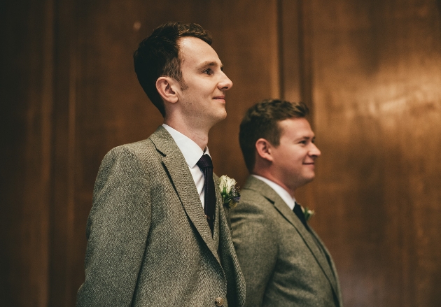 Groom waiting at the altar