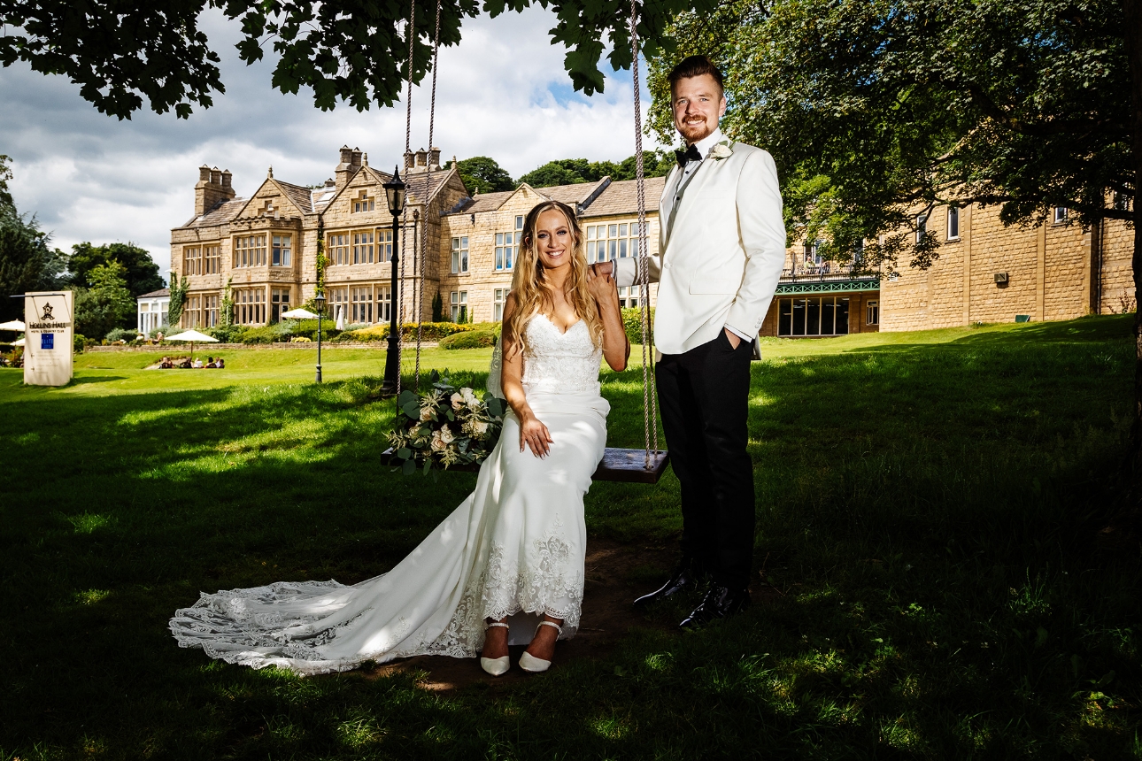 Bride sat on tree swing