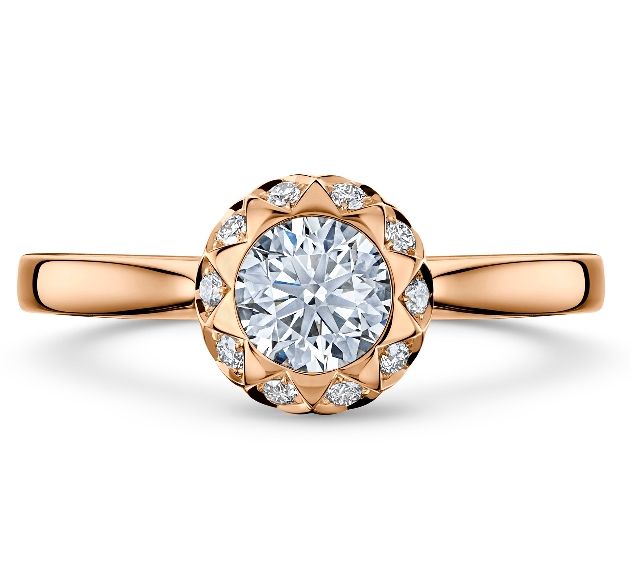 Gold circular engagement ring named Asteria