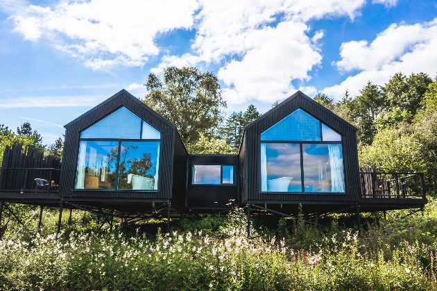 boathouse with large windows looking out at lake