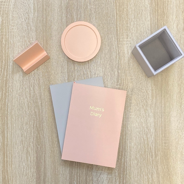 pastel peach coloured  notebook