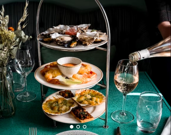 afternoon tea image with seafood and rose wine
