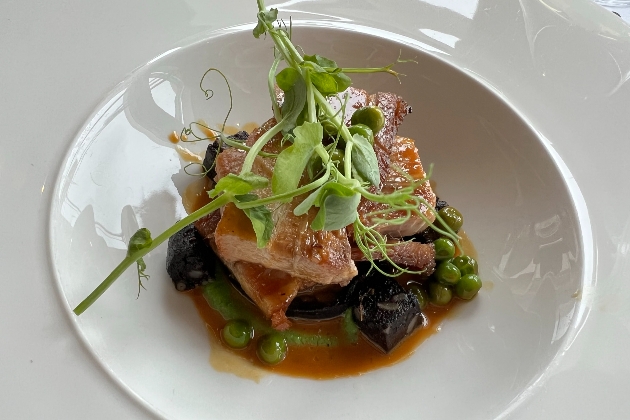 pork dinner on a plate garnished 