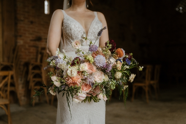 bridal bouquet held by bride