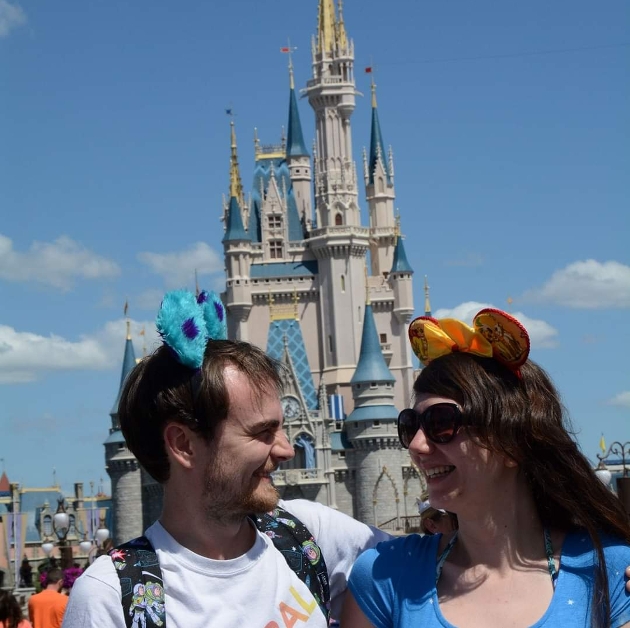 Leeds couple in front of Disney castle