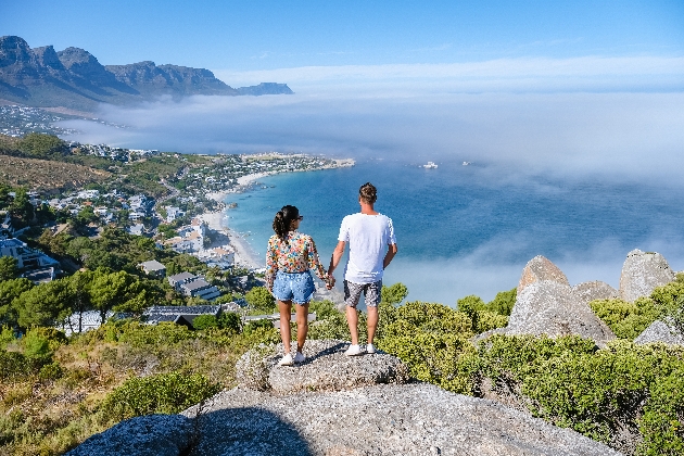 View from The Rock viewpoint in Cape Town over Campsbay, view over Camps Bay with fog over the ocean