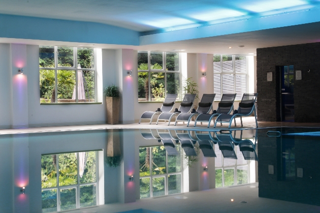 Huddersfield’s Titanic Spa pool with loungers poolside soft lighting