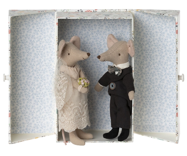 two toy mice in wedding clothes in a pretty box