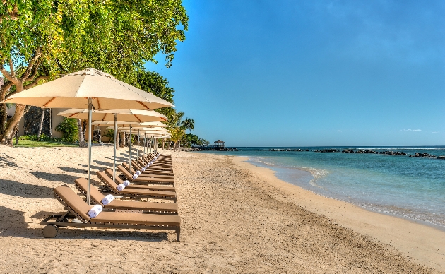 Sun loungers looking out at the sea