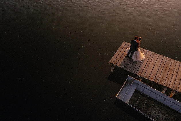 Aerial view of couple on bridge