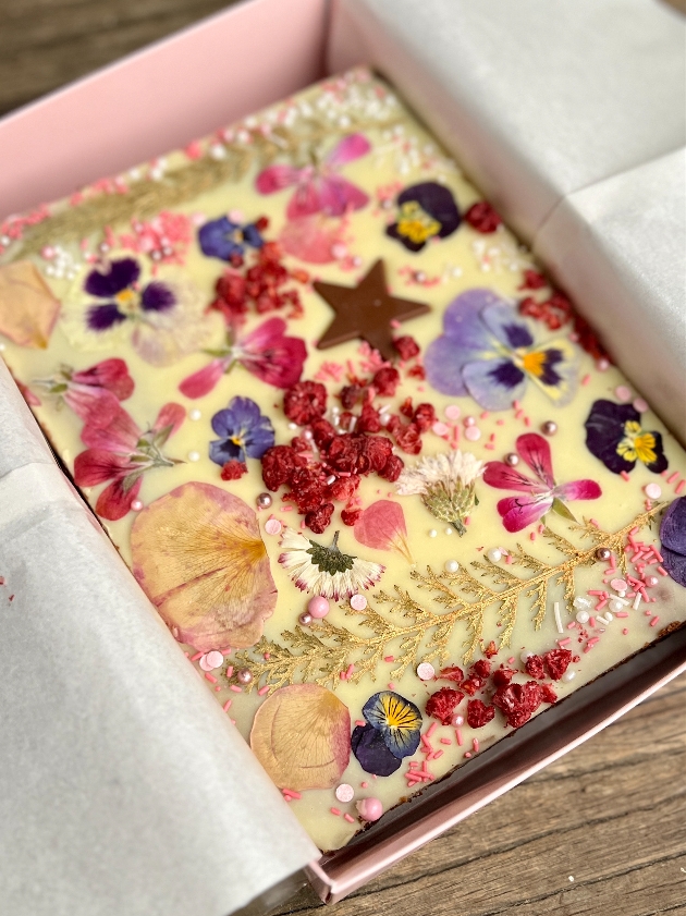 brownie tray bake in white chocolate with pressed flowers
