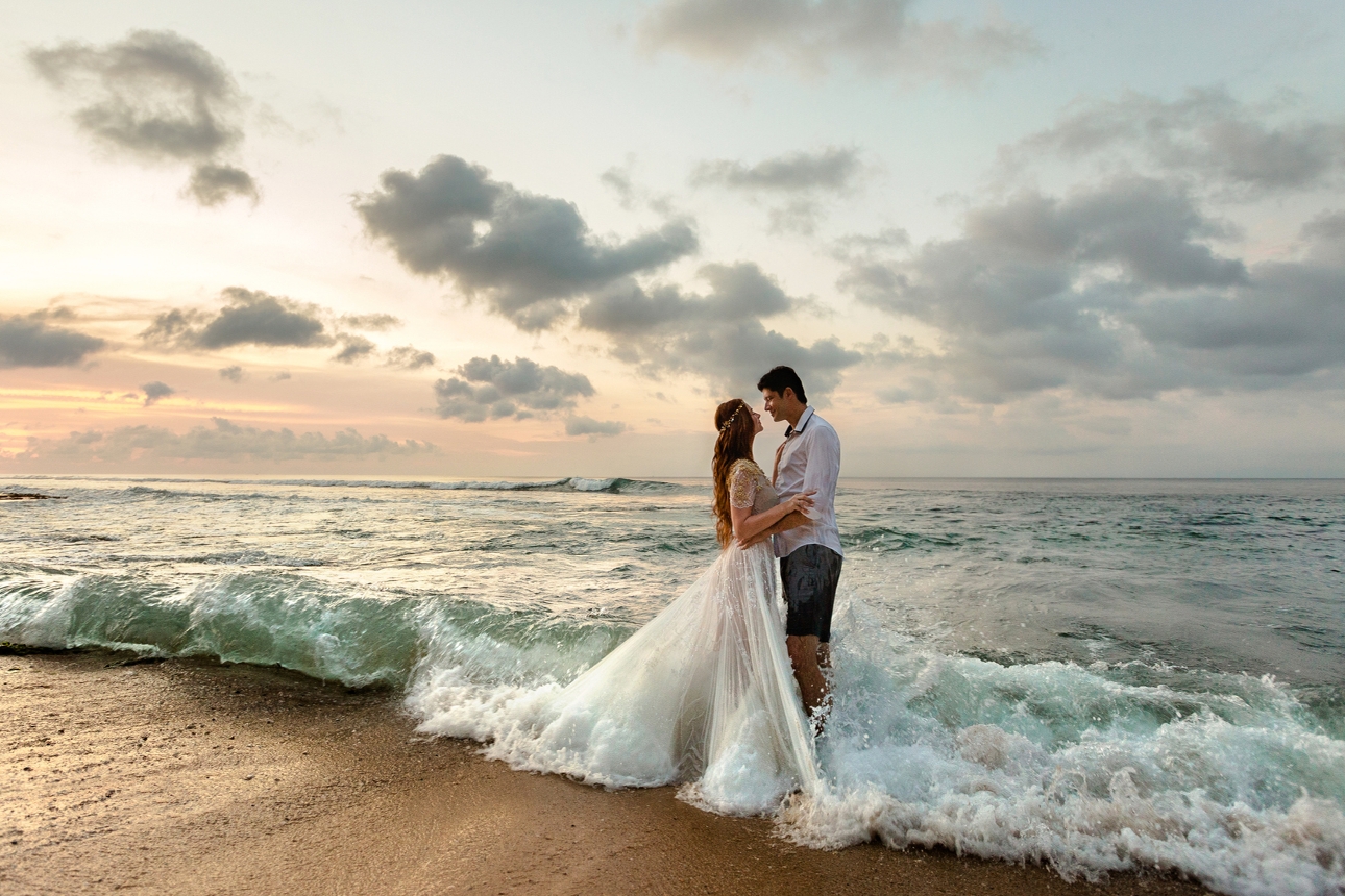 couple on beach at sunset english seaside