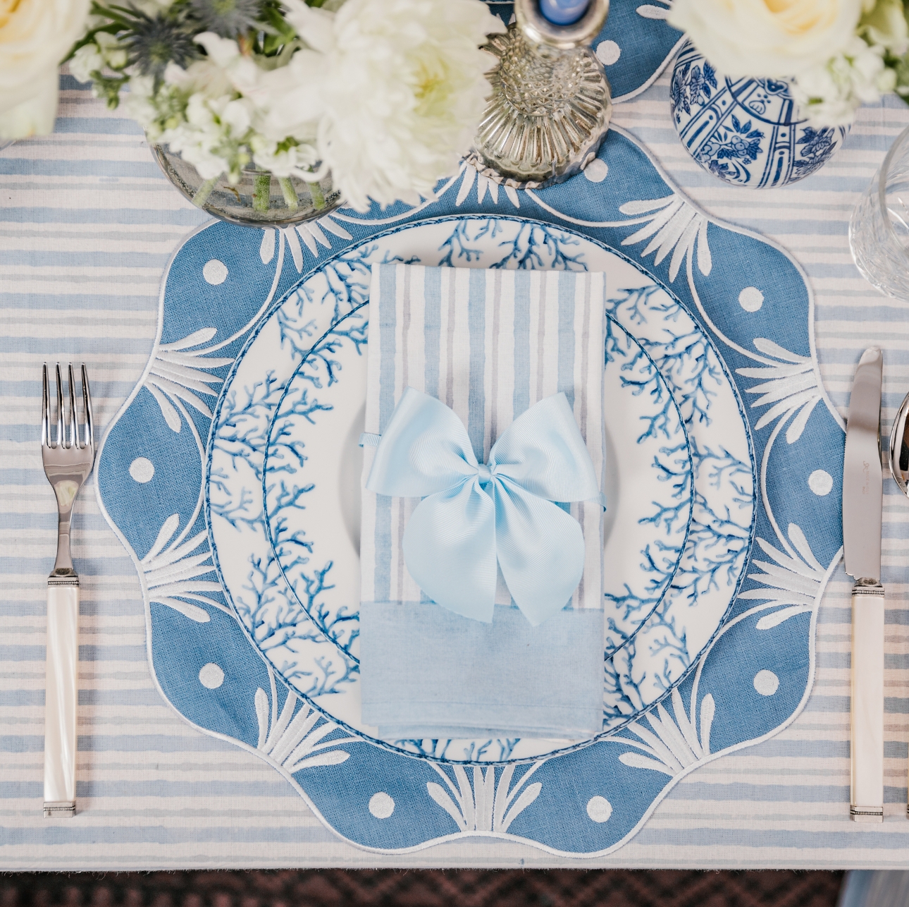 table place setting in blue and white