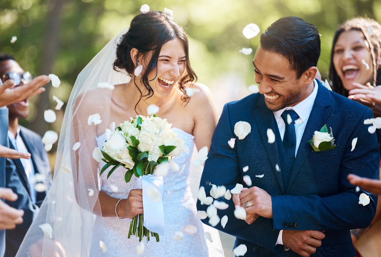 couple just wed confetti thrown over them