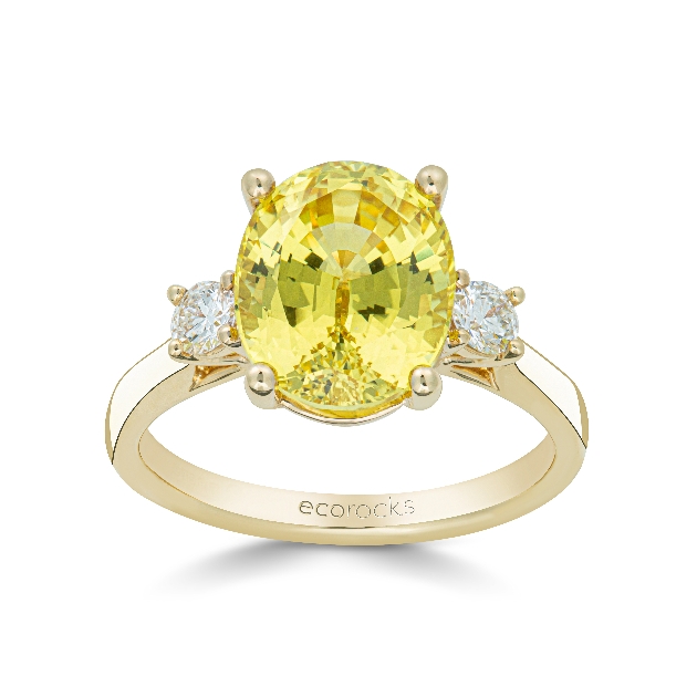 yellow gem and yellow gold band on ring