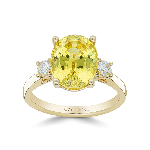 yellow gem and yellow gold band on ring