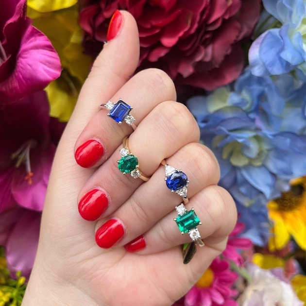 colourful gemstone rings on hand