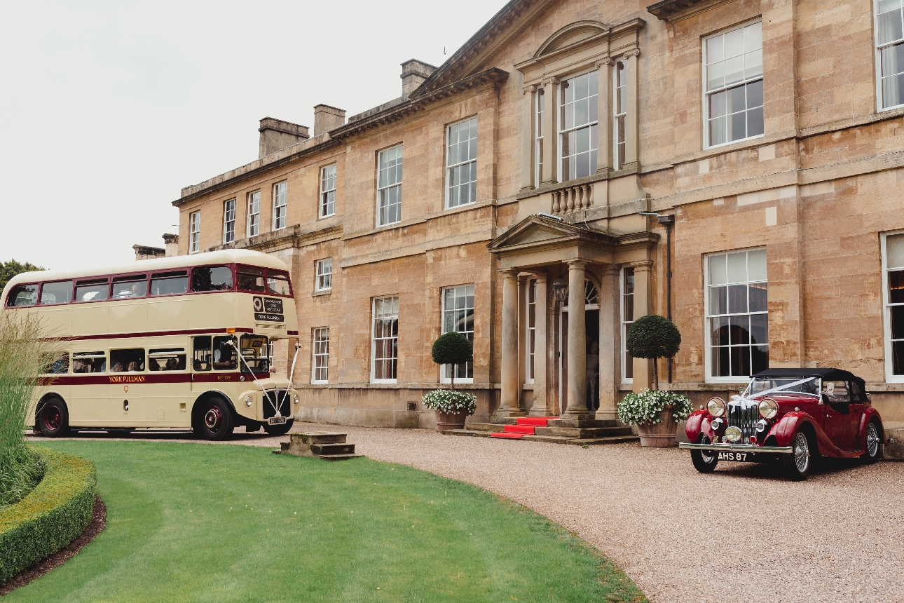 Bowcliffe Hall bus and car outside