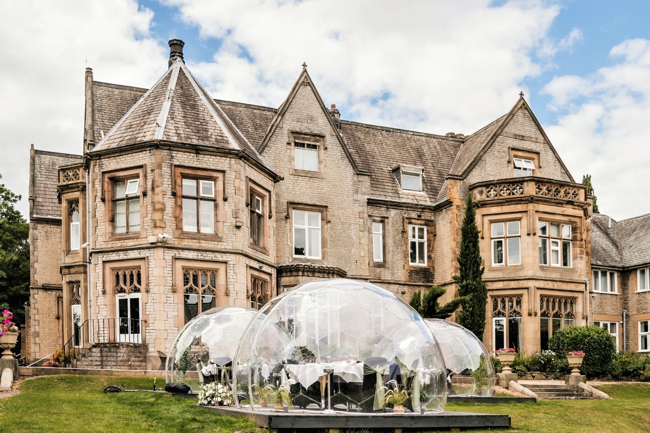 Kenwood Hall gardens with domes for outdoor tables and chairs