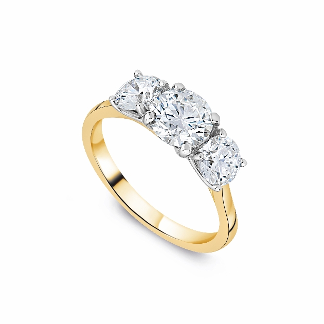 gold ring with trilogy circle diamonds