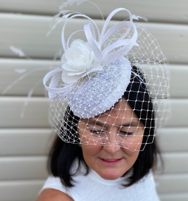 Liz from Simply Devine wearing one of her hats