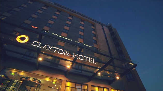 Exterior of Clayton Hotel Leeds at dusk
