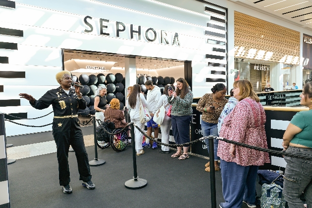 people queuing for opening of Sephora in Meadowhall