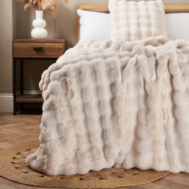 scalloped faux fur throw