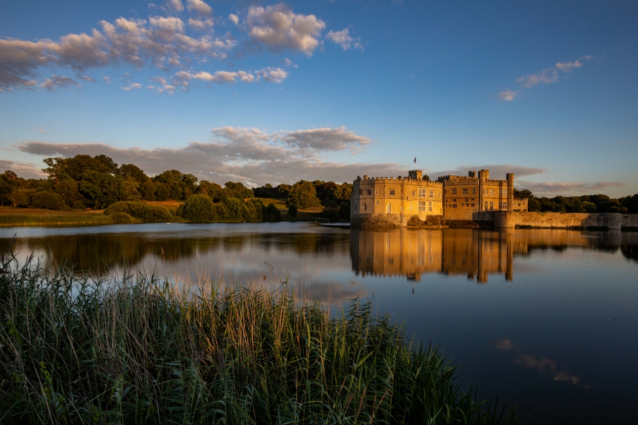Leeds castle at sun set reflection in lake