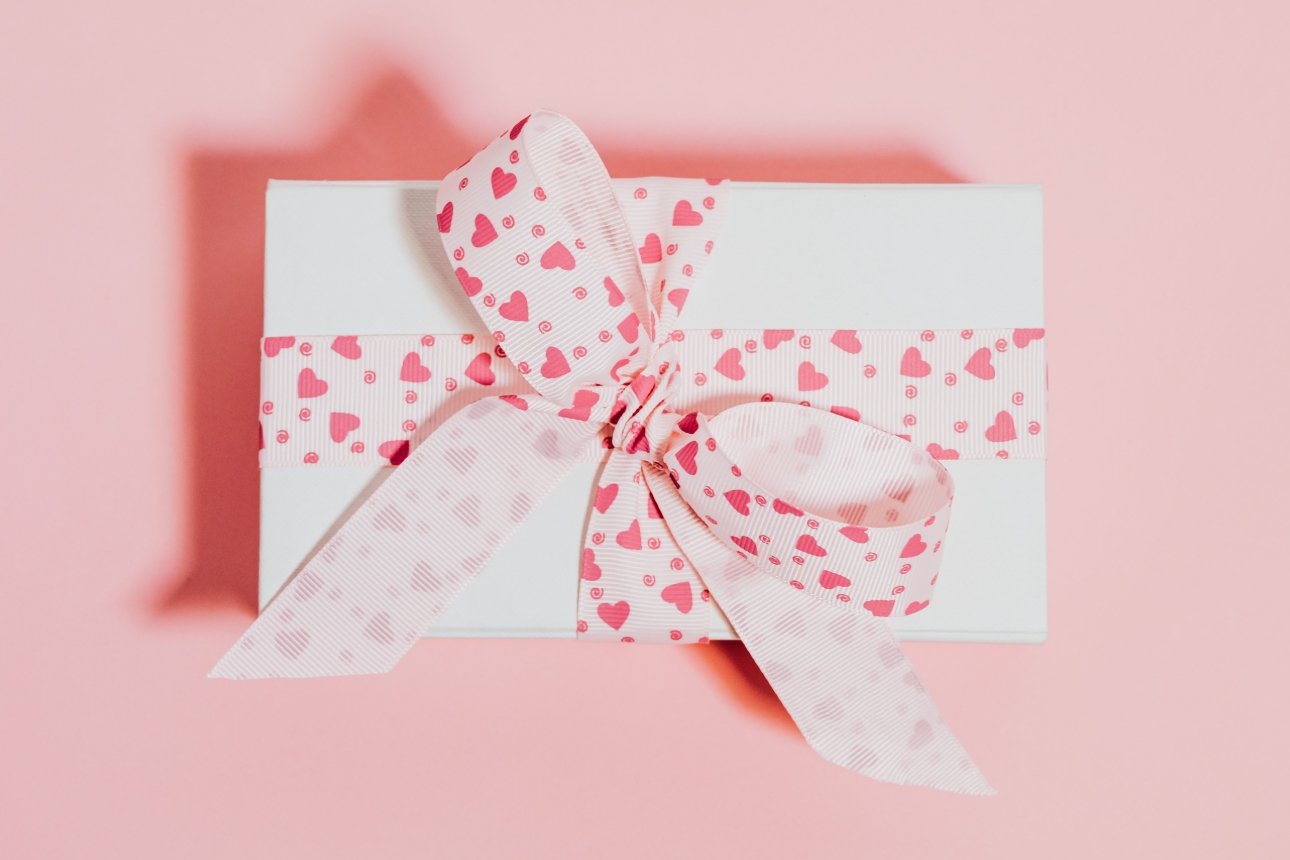 gift box with heart ribbon