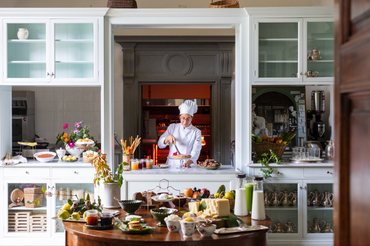 chef in a quaint kitchen style restaurant